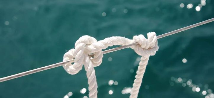 Faxco triple-strand cotton rope showcasing natural beige fibers and secure grip texture for climbing holds