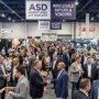 Wholesale buyers and vendors networking at ASD Market Week Las Vegas 2026 trade show floor