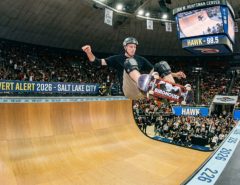 Tony Hawk performing a trick on a vert ramp at the Jon M. Huntsman Center during Vert Alert 2026 in Salt Lake City, Utah