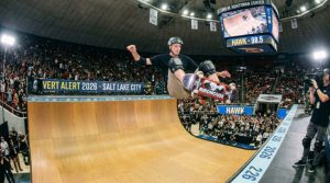 Tony Hawk performing a trick on a vert ramp at the Jon M. Huntsman Center during Vert Alert 2026 in Salt Lake City, Utah