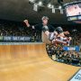 Tony Hawk performing a trick on a vert ramp at the Jon M. Huntsman Center during Vert Alert 2026 in Salt Lake City, Utah