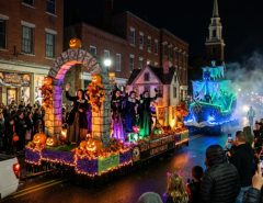 Salem Haunted Happenings Grand Parade floats moving through downtown Salem at night
