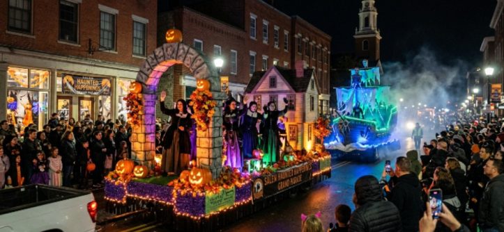 Salem Haunted Happenings Grand Parade floats moving through downtown Salem at night