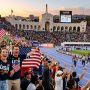 Spectators cheering during the LA28 Olympics 2028 with athletes competing in a packed stadium