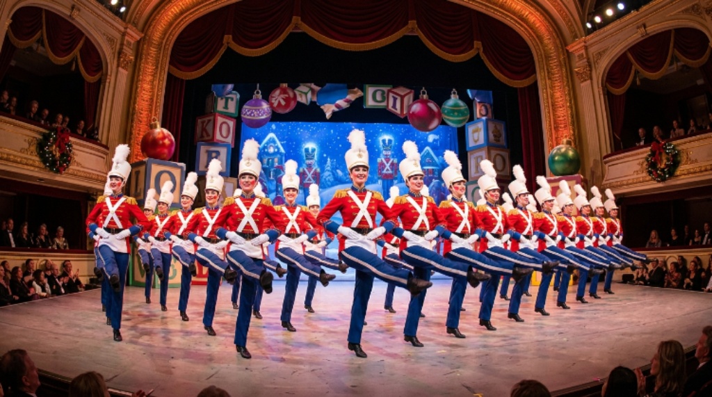 Dancers in festive costumes during the Parade of the Wooden Soldiers scene