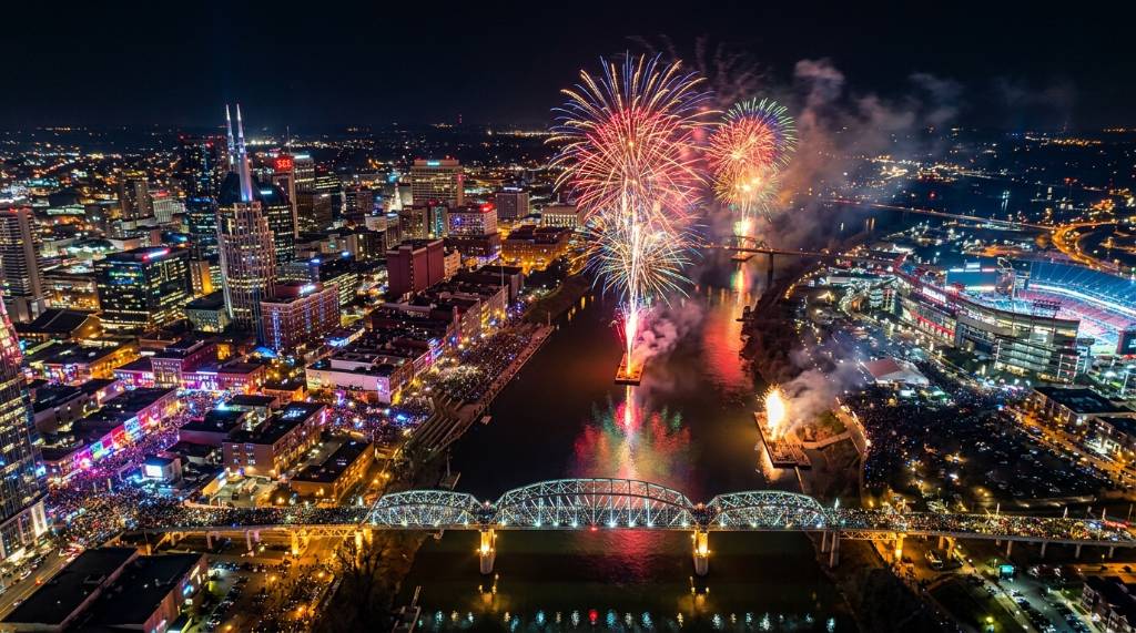 Aerial view of Nashville skyline and Cumberland River fireworks display on December 31